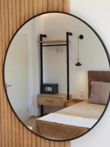 A bed or beds in a room at Sand and Sea