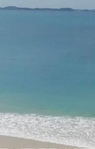 Billede fra billedgalleriet på Apartamento pé na Areia de Frente para o Mar i Arraial do Cabo