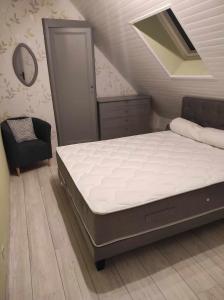 Llit o llits en una habitació de Fée Morgane - Chambres