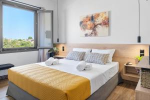 Postel nebo postele na pokoji v ubytování Dimargi Apartments + 37 fotografií