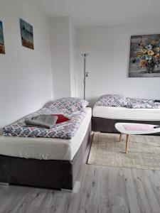 Ένα ή περισσότερα κρεβάτια σε δωμάτιο στο 40L 4.OG L