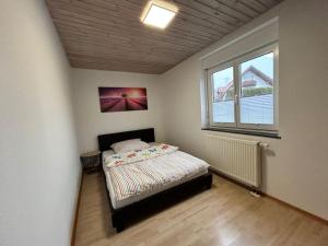 Postelja oz. postelje v sobi nastanitve Wohnung Nähe Bodensee & Allgäu ideal für Familien