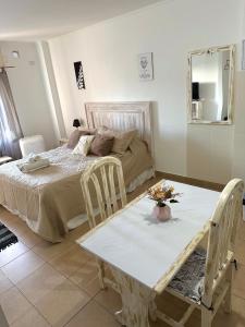 Ένα ή περισσότερα κρεβάτια σε δωμάτιο στο Alquileres Temporales Monoambiente Zona Centro