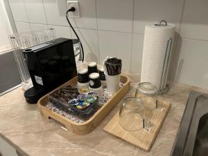 a kitchen counter with a coffee maker and a toaster at SHINE Apartment View Lugano Paradise Parking Free in Paradiso