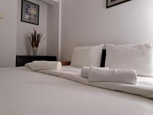 Una cama o camas en una habitación de Hotel Marica