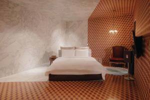 Ένα ή περισσότερα κρεβάτια σε δωμάτιο στο Gangnam Boutique Hotel Sohsul