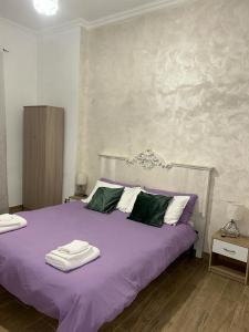 Кровать или кровати в номере Pigneto Dreams rooms