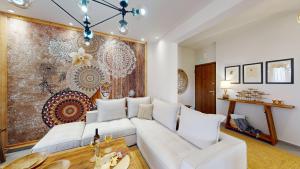 Ruang duduk di MOENIA LUXURY APARTMENT