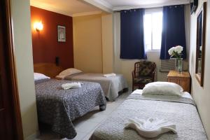 Krevet ili kreveti u jedinici u objektu Hotel Toledo