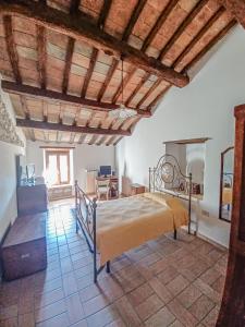 Giường trong phòng chung tại Antico Casolare Gregori
