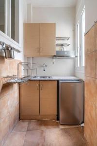 a kitchen with a sink and a dishwasher at STM Monastiraki Acropolis Apt in Athens