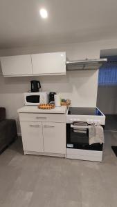 Joli appartement F2 entièrement rénovéにあるキッチンまたは簡易キッチン