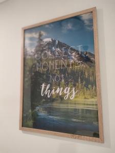 a picture of a mountain not things on a wall at Spacious Modern Acreage Getaway- close to Shopping mall in Browns Plains