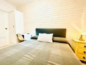 Postel nebo postele na pokoji v ubytování Hostal La Taberna