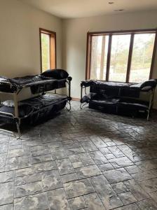 a room with two beds in the corner of a room at For a private, stunning vacation home or retreat in Lancaster +13 photos