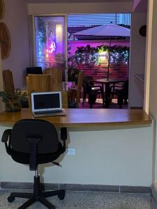 TV a/nebo společenská místnost v ubytování Apartamento Turismo en Ibagué ESMERALDA