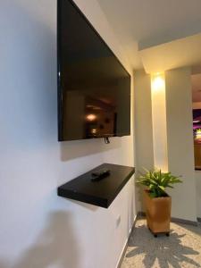 TV a/nebo společenská místnost v ubytování Apartamento Turismo en Ibagué ESMERALDA