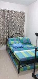 מיטה או מיטות בחדר ב-Blueberry Transient House