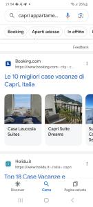 a screenshot of a cell phone with a screenshot of a webpage at Casa Leucosia Suites in Capri