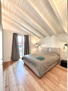 Легло или легла в стая в Appartamento di design con posto auto.