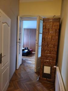 a hallway with a door leading to a living room at Agnieszki Room nr 1 in Krakow