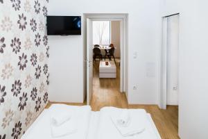 Posteľ alebo postele v izbe v ubytovaní Vienna Stay Apartments Belvedere