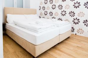 Posteľ alebo postele v izbe v ubytovaní Vienna Stay Apartments Belvedere