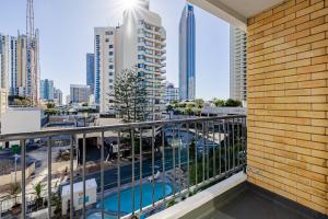 a balcony with a view of the city at Bunk Surfers Paradise International Backpacker Hostel in Gold Coast