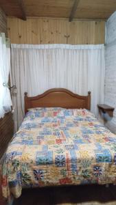 Tempat tidur dalam kamar di Casa en Costa Azul - Canelones