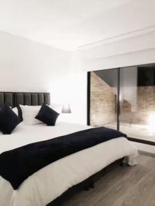 Postel nebo postele na pokoji v ubytování Apartamento moderno con balcón o terraza