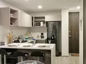 Kuchyň nebo kuchyňský kout v ubytování Apartamento moderno con balcón o terraza