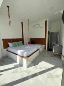 Postel nebo postele na pokoji v ubytování Hotel Casa Cafur