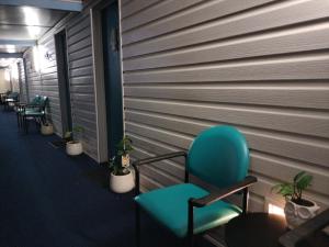 Posezení v ubytování Nationwide Motel