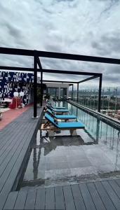 a pool on the top of a building at SkyGarden Nunciatura Luxury Apartment in San José