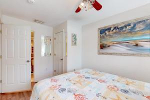 Ένα ή περισσότερα κρεβάτια σε δωμάτιο στο Coastal Dreams +16 φωτογραφίες