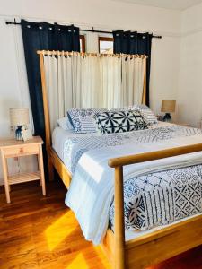 Voodi või voodid majutusasutuse Riverpath Inn toas