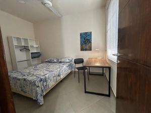 Llit o llits en una habitació de La Petite