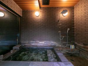 Salle de bains dans l'établissement Yumotoan Kiyohime