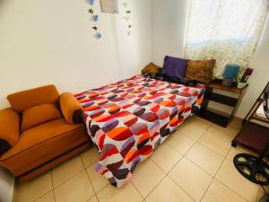 Katil atau katil-katil dalam bilik di Casa en alquiler por día