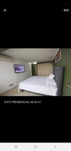 เตียงในห้องที่ Habitaciones en las condes, Cercano a metro