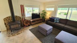 Zona de estar de Feathertop Views and Barn