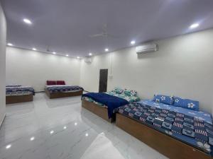 Una cama o camas en una habitación de MPN RESORTS AND HOTELS PRIVATE LIMITED