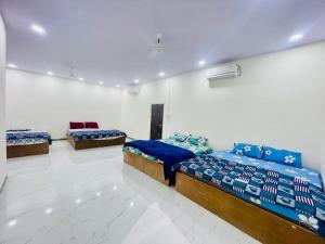 Ένα ή περισσότερα κρεβάτια σε δωμάτιο στο MPN RESORTS AND HOTELS PRIVATE LIMITED