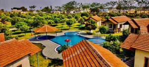 an aerial view of a resort with a swimming pool at MPN RESORTS AND HOTELS PRIVATE LIMITED in Hyderabad