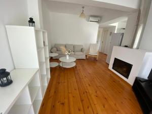 Et opholdsområde på F R Apartment