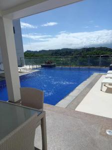 a view of a swimming pool from a house at Boracay Newcoast top floor view in Boracay