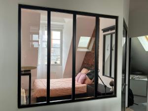 Duplex Élégant et Lumineux avec vue sur le château客房内的一张或多张床位