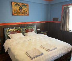 Hotel De Purang客房内的一张或多张床位