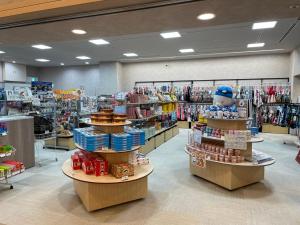 a store aisle with a lot of products on display at Spa World HOTEL&RESORT in Osaka