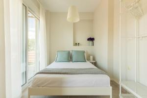 Posteľ alebo postele v izbe v ubytovaní Siviri Forest View Apartment